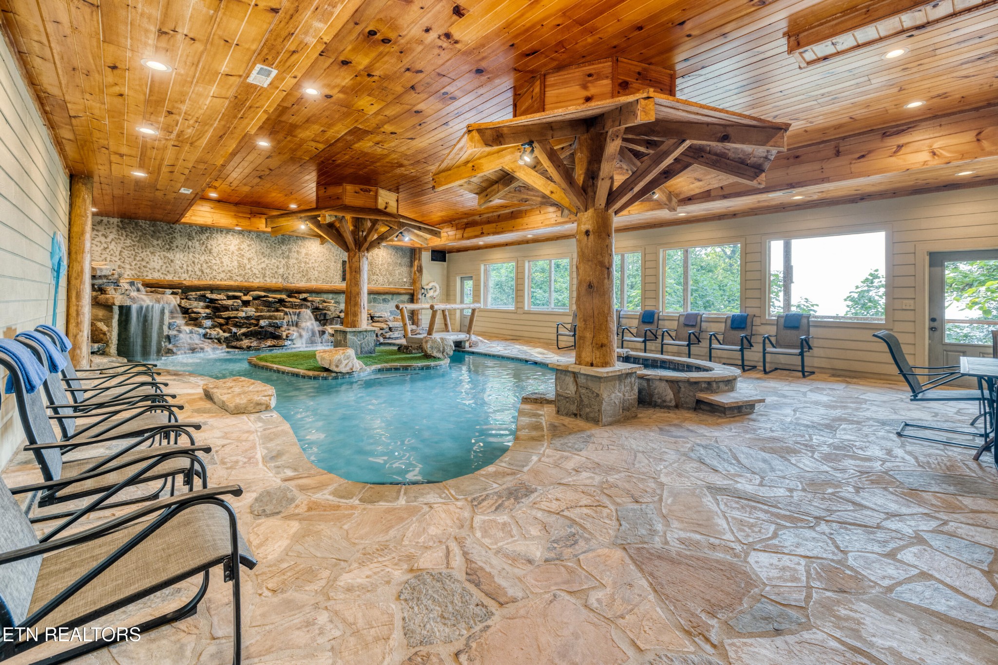 809 Pinecrest Way Sevierville, TN 37862 - Photo 23 of 60 a view of a swimming pool with chairs in patio