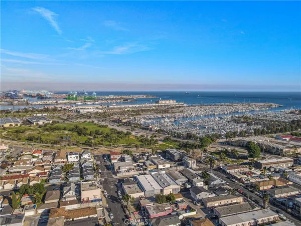 an aerial view of residential building and car parked