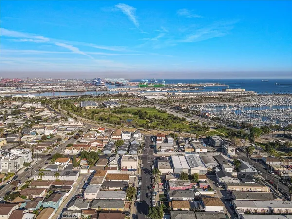 an aerial view of residential building with parking space