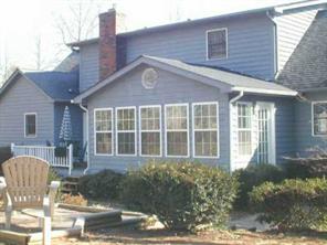 8065 Fairfield Forest Road Denver, NC 28037 - Photo 2 of 8 a front view of a house with garden