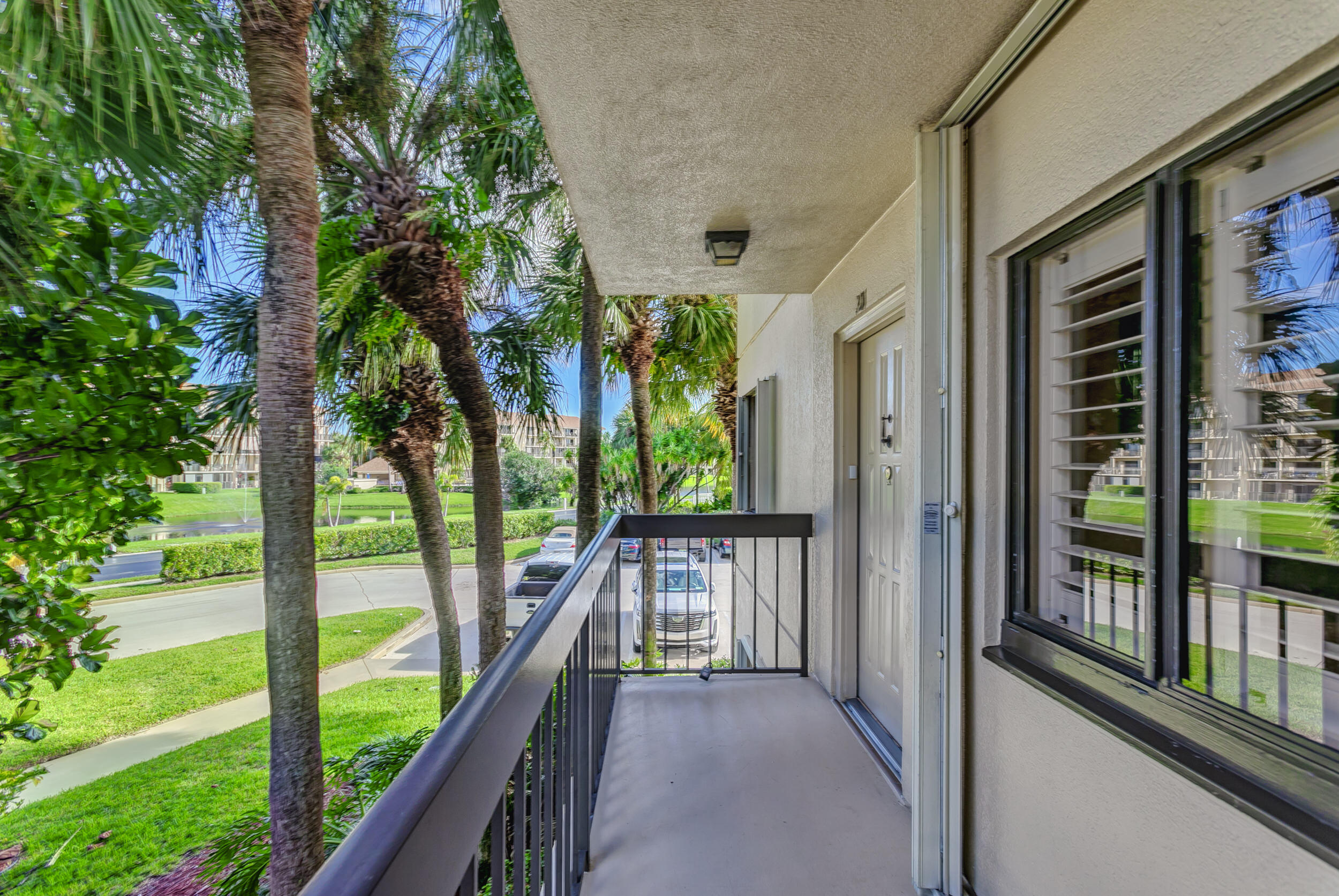 1401 Tidal Pointe Boulevard, Unit 201 Jupiter, FL 33477 - Photo 6 of 45 Entrance to #201