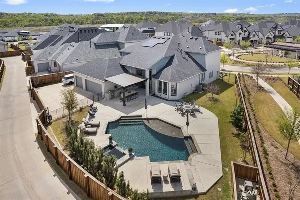 an aerial view of a house with a ocean view
