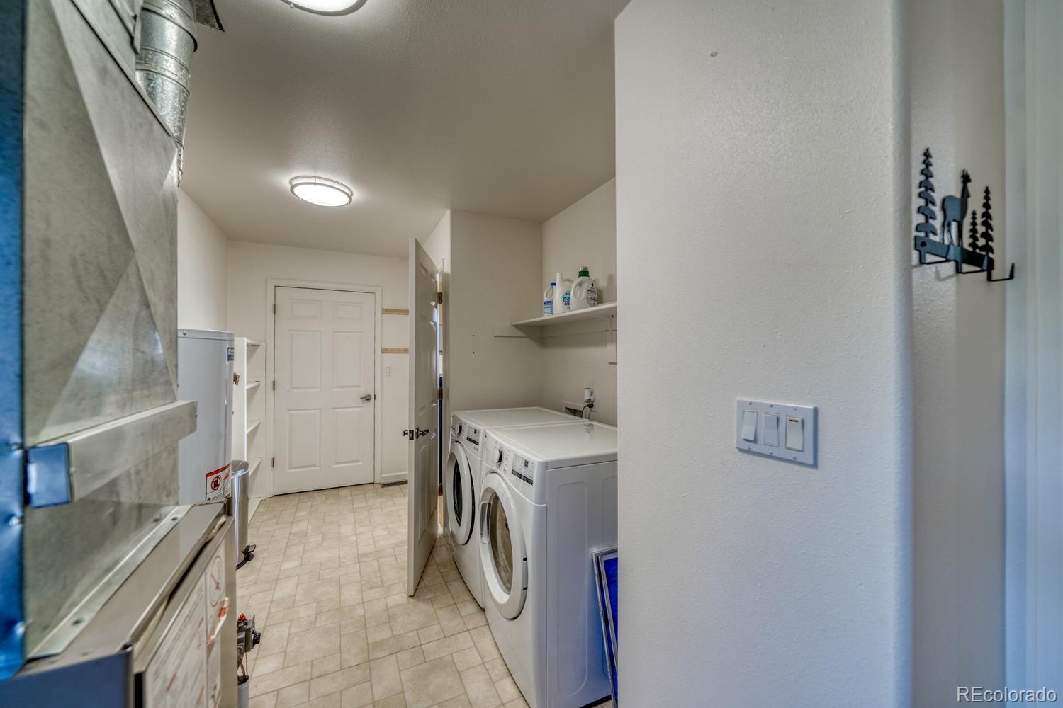31015 West Ridge Road Buena Vista, CO 81211 - Photo 11 of 48 a view of a storage & utility room with a sink