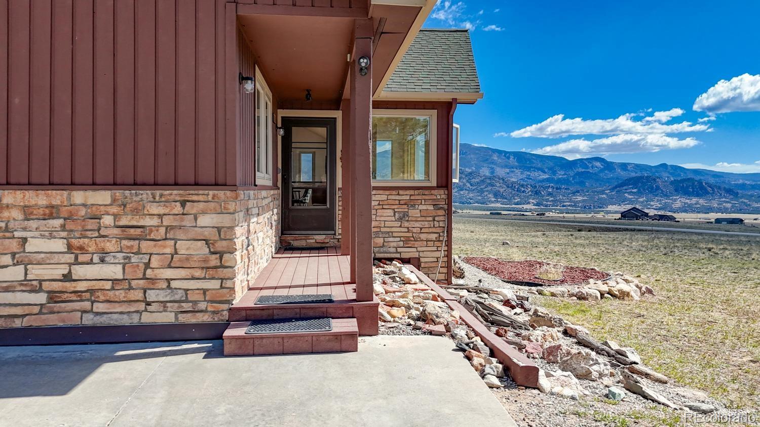 31015 West Ridge Road Buena Vista, CO 81211 - Photo 28 of 48 a front view of a house with a yard