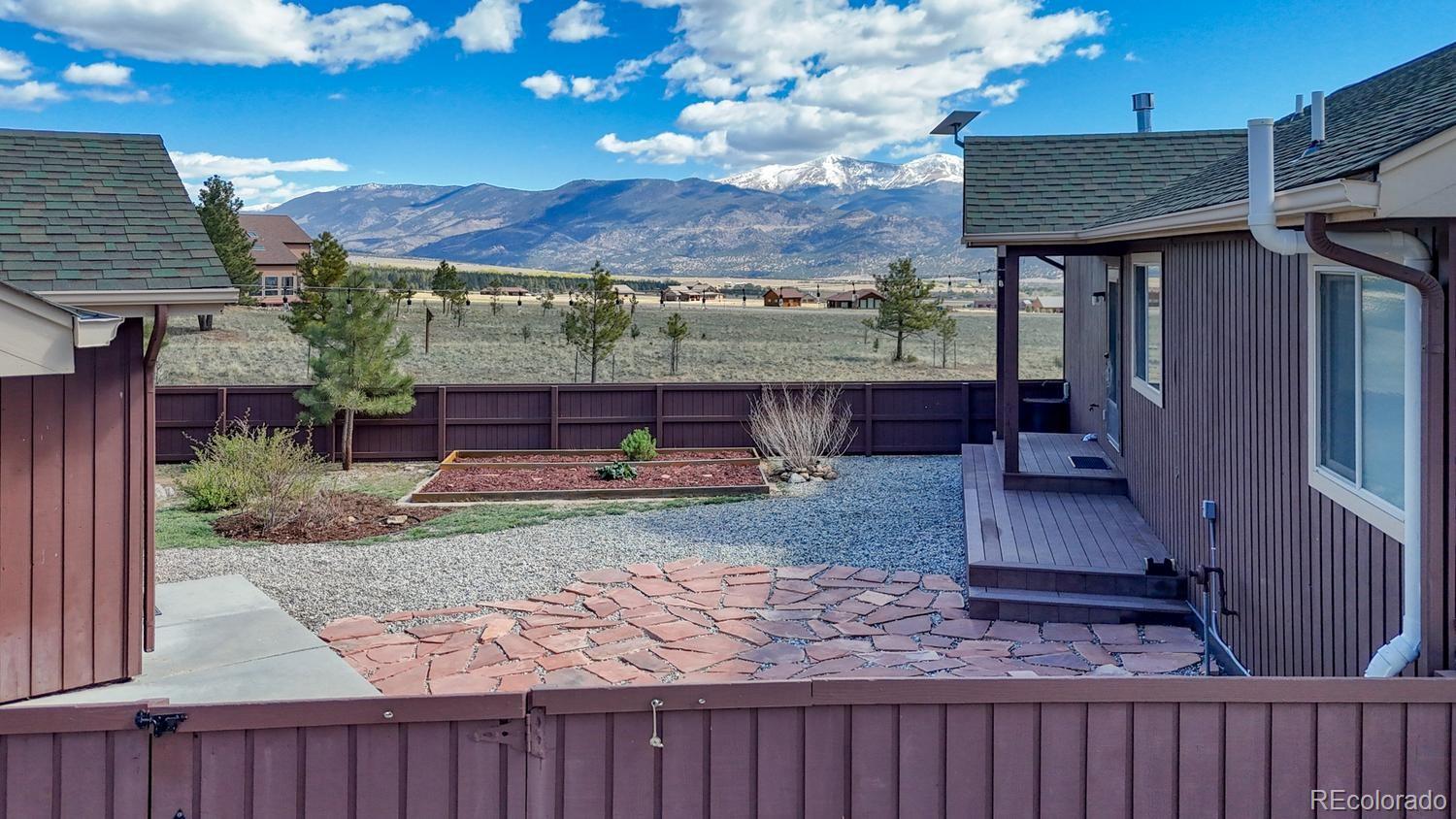31015 West Ridge Road Buena Vista, CO 81211 - Photo 33 of 48 a view of a house with a yard