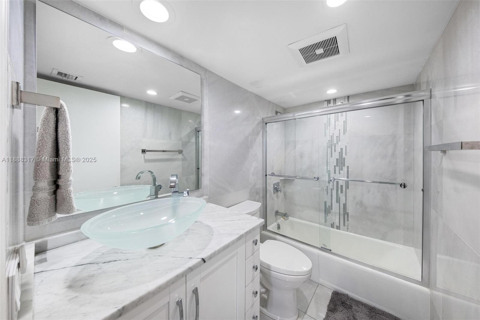 520 Brickell Key Drive, Unit A710 Miami, FL 33131 - Photo 8 of 43 a bathroom with a sink toilet and shower