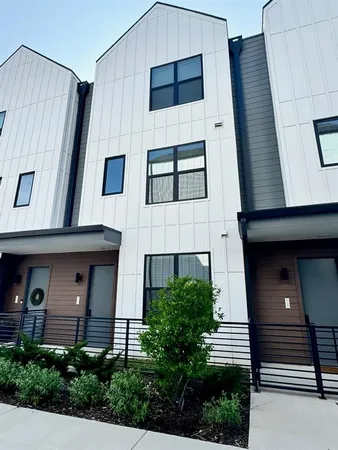 a front view of a house with stairs