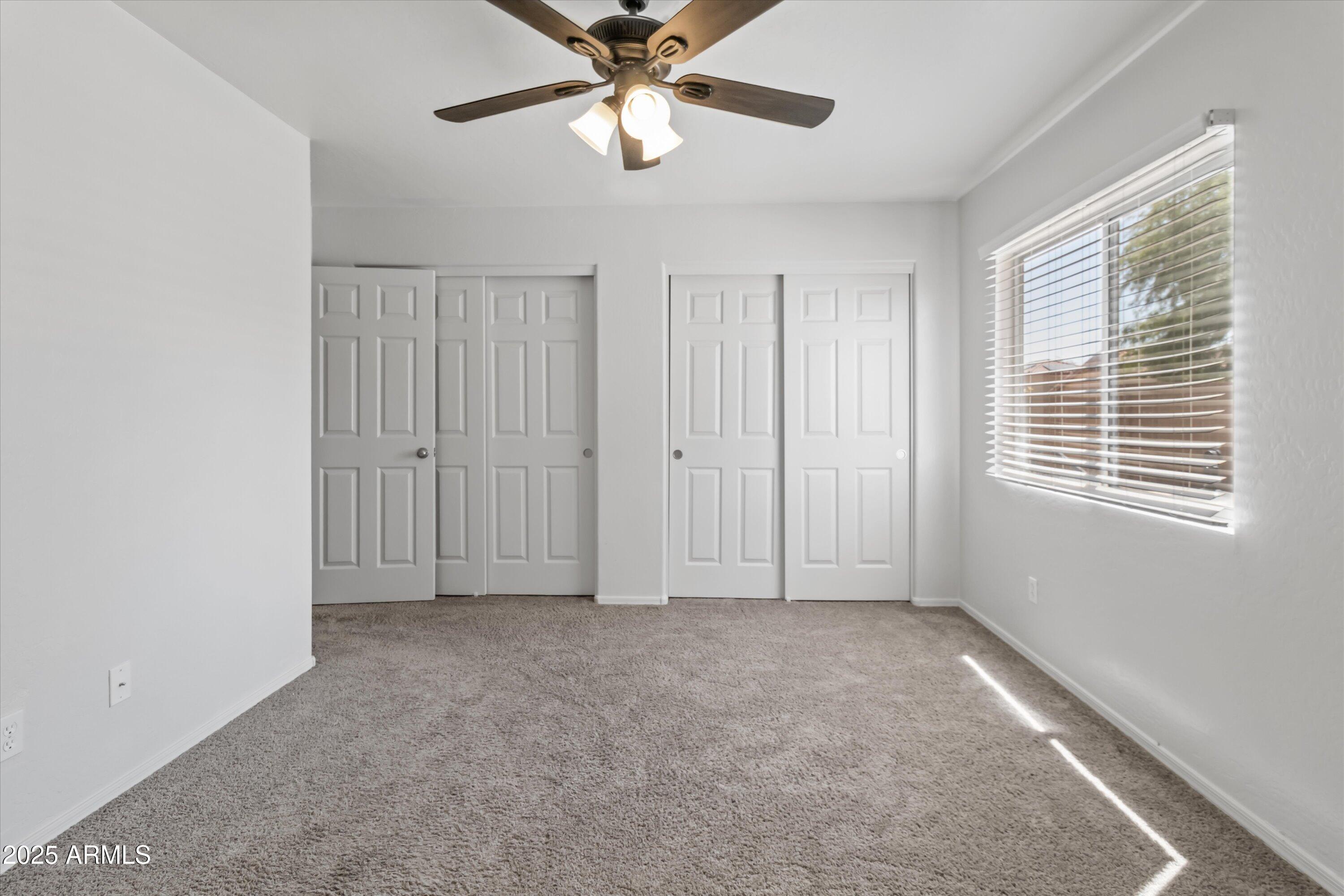 11921 West Bloomfield Road El Mirage, AZ 85335 - Photo 14 of 24 a view of an empty room with a window