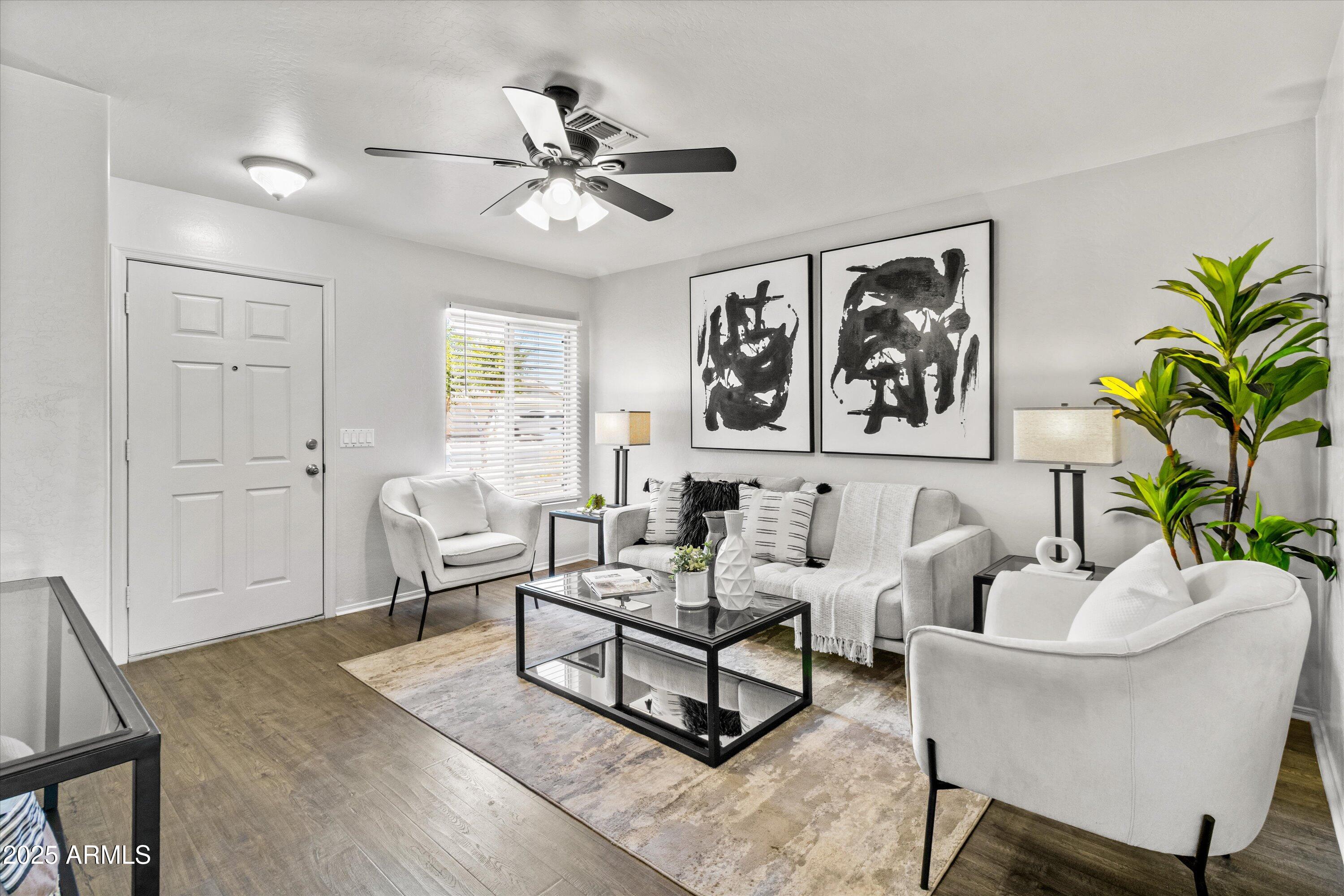 11921 West Bloomfield Road El Mirage, AZ 85335 - Photo 3 of 24 a living room with furniture