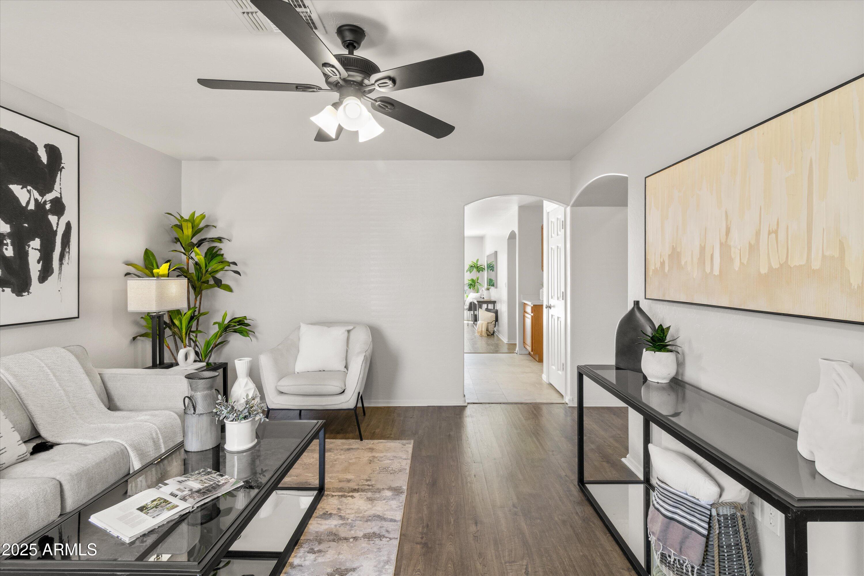 11921 West Bloomfield Road El Mirage, AZ 85335 - Photo 4 of 24 a living room with furniture