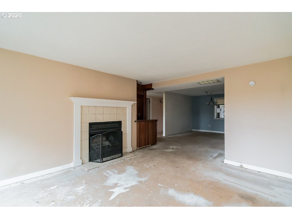 5620 Southwest Riverside Lane Portland, OR 97239 - Photo 12 of 25 a view of a livingroom with a fireplace