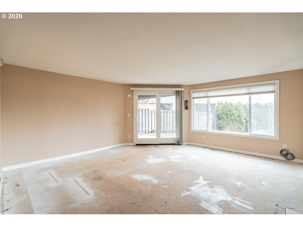 5620 Southwest Riverside Lane Portland, OR 97239 - Photo 14 of 25 a view of an empty room with a window