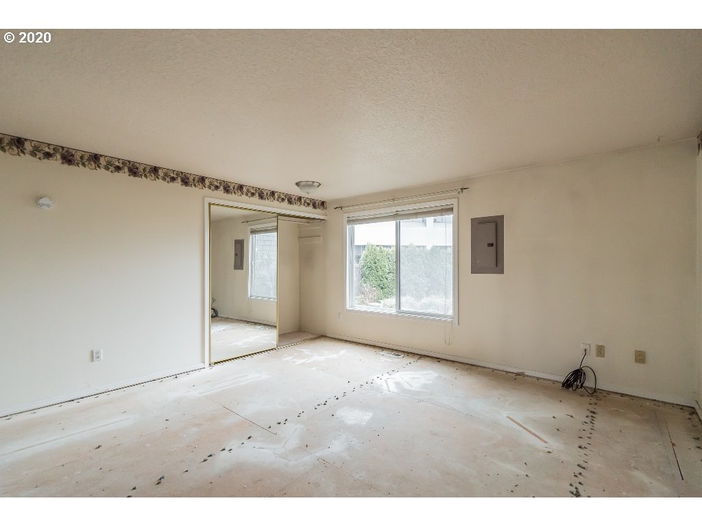 5620 Southwest Riverside Lane Portland, OR 97239 - Photo 15 of 25 a view of an empty room with a window