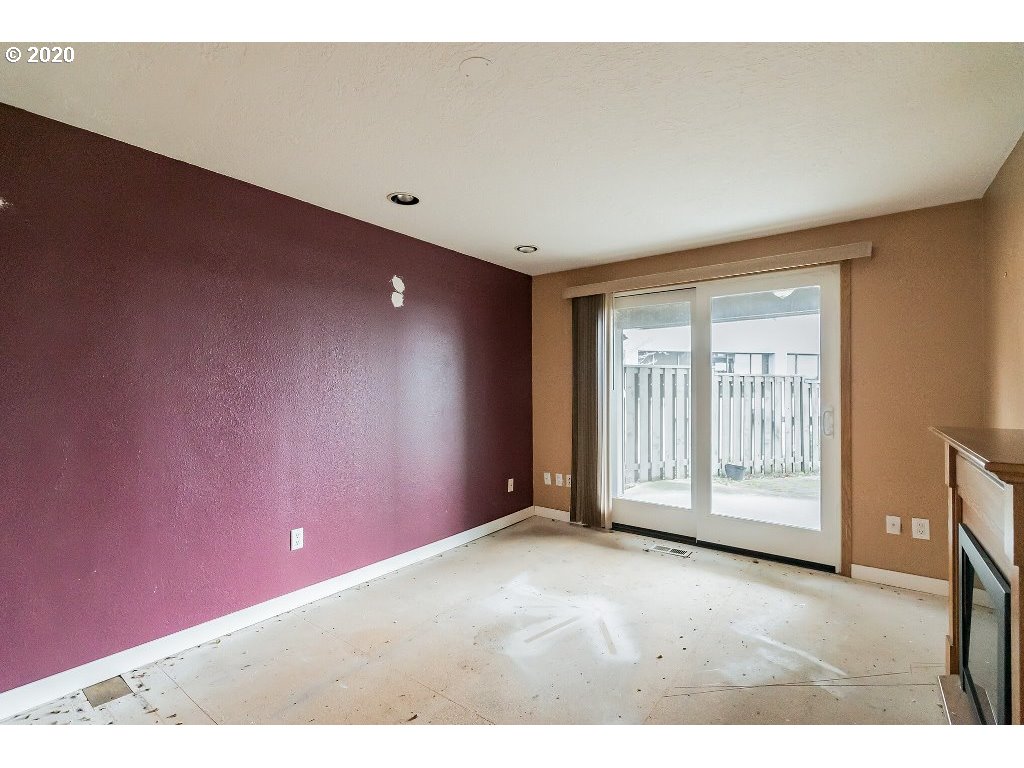5620 Southwest Riverside Lane Portland, OR 97239 - Photo 19 of 25 a view of an empty room with a window