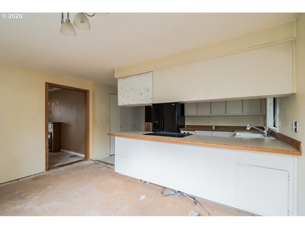 5620 Southwest Riverside Lane Portland, OR 97239 - Photo 21 of 25 a view of a kitchen with a sink
