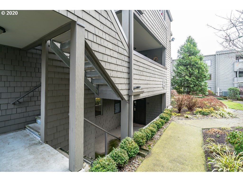 5620 Southwest Riverside Lane Portland, OR 97239 - Photo 7 of 25 a view of a house with a yard