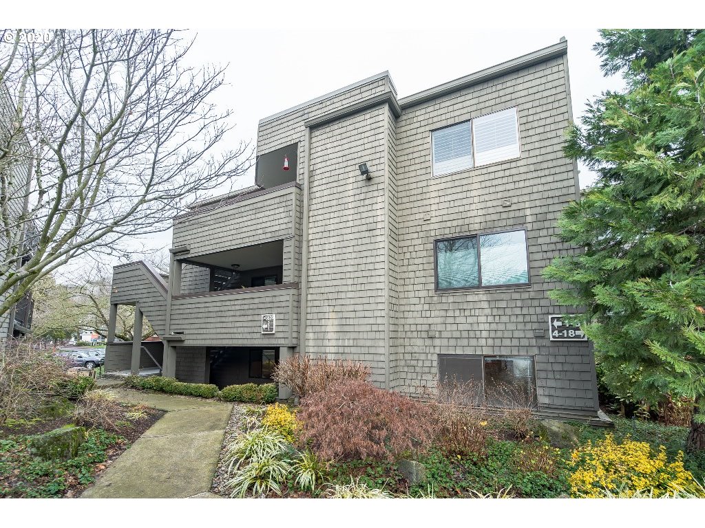 5620 Southwest Riverside Lane Portland, OR 97239 - Photo 8 of 25 a view of a house with a yard and furniture