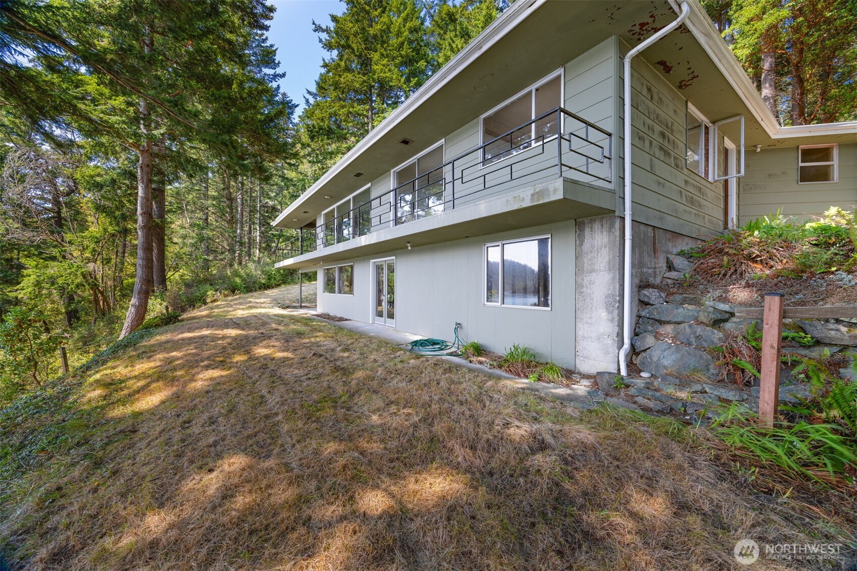 5318 Quiet Cove Road Anacortes, WA 98221 - Photo 13 of 32 a view of backyard of house
