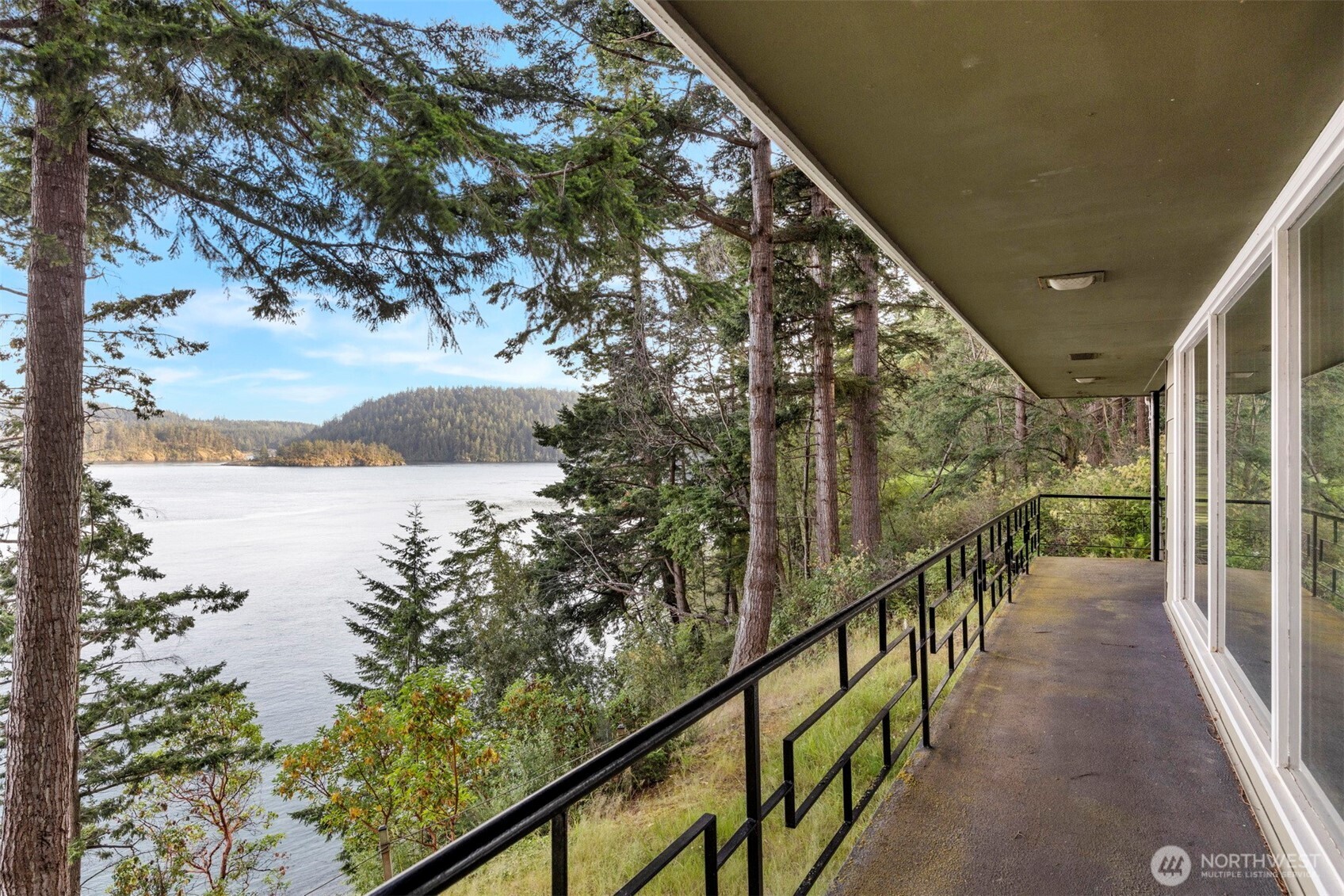 5318 Quiet Cove Road Anacortes, WA 98221 - Photo 25 of 32 a view of a balcony with an ocean view