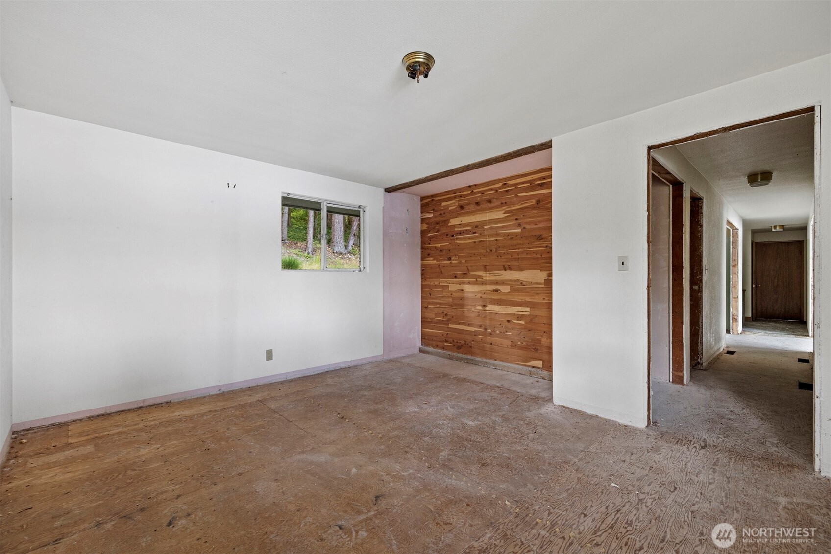 5318 Quiet Cove Road Anacortes, WA 98221 - Photo 29 of 32 a view of an empty room with a closet