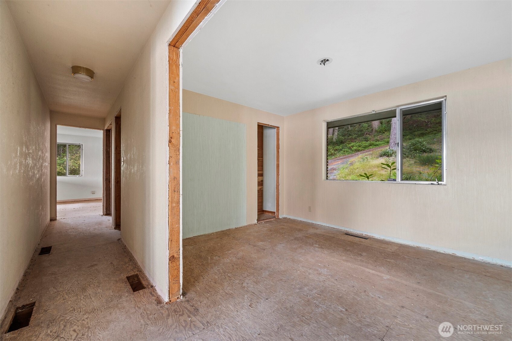 5318 Quiet Cove Road Anacortes, WA 98221 - Photo 31 of 32 an empty room with windows and closet