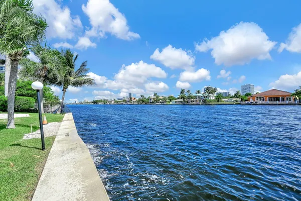 a view of a chair and table in the balcony
