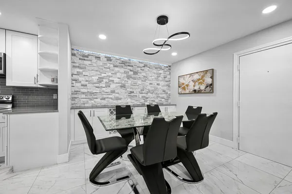 a view of a workspace with furniture and toys