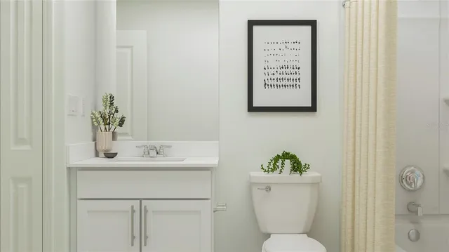 a bathroom with a toilet a sink and a mirror