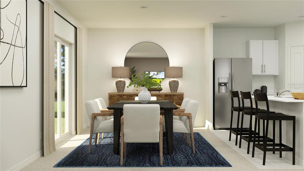 2170 Lasso Loop Eagle Lake, FL 33839 - Photo 5 of 30 a view of a dining room with furniture and a rug
