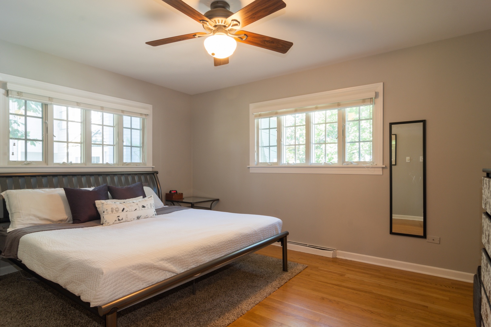 1122 Kenton Road Deerfield, IL 60015 - Photo 6 of 10 a bedroom with a bed and a window