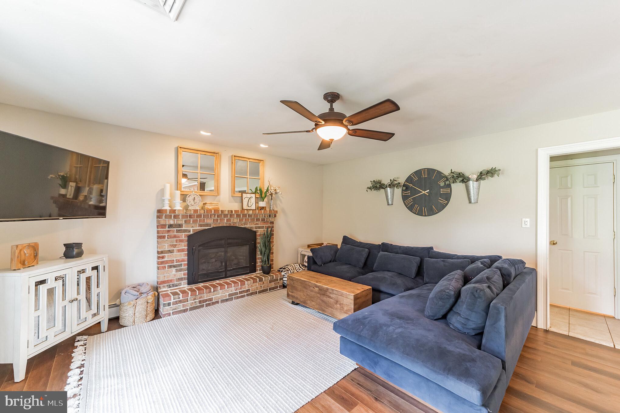 418 Yoder Road Harleysville, PA 19438 - Photo 14 of 28 Family Room with propane Fireplace