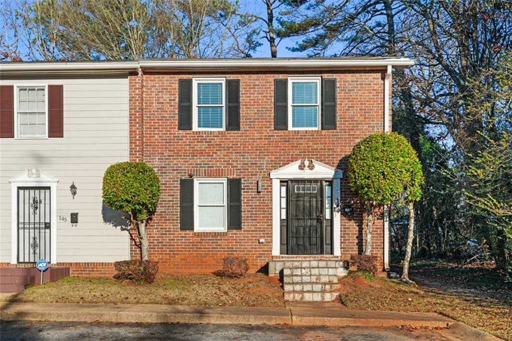 144 Glen Acres Court Decatur, GA 30035 - Photo 1 of 1 a front view of a house with yard