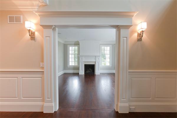 29 Cornell Road Wellesley, MA 02482 - Photo 3 of 23 a view of a livingroom with wooden floor and a fireplace