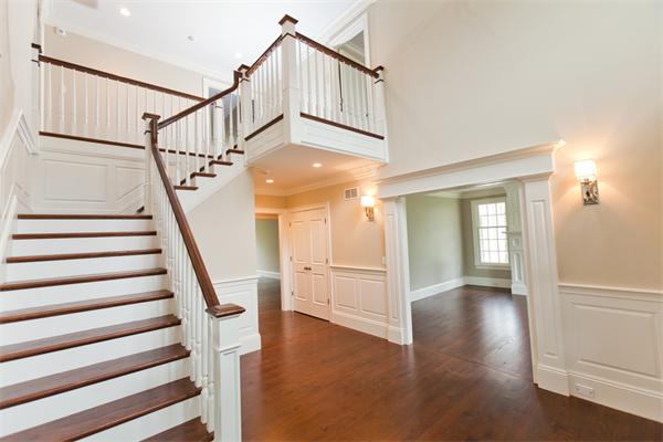 29 Cornell Road Wellesley, MA 02482 - Photo 4 of 23 a view of staircase with white walls and a window