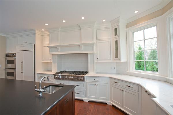 29 Cornell Road Wellesley, MA 02482 - Photo 5 of 23 a kitchen with a sink stove and refrigerator