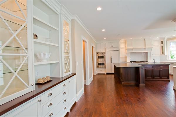 29 Cornell Road Wellesley, MA 02482 - Photo 7 of 23 a kitchen with stainless steel appliances granite countertop a refrigerator and a stove top oven