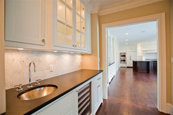 29 Cornell Road Wellesley, MA 02482 - Photo 9 of 23 a kitchen with a sink and cabinets
