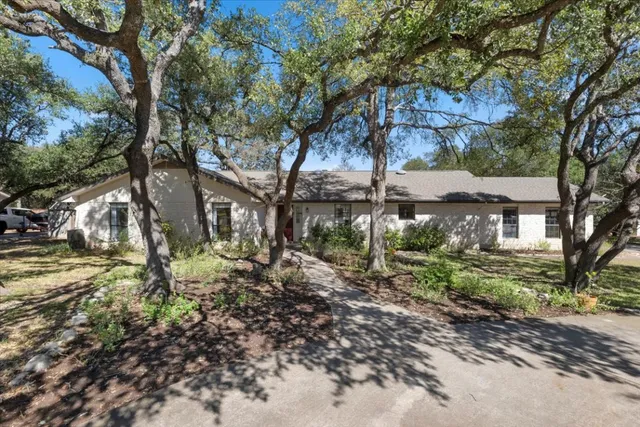 a backyard of a house with lots of green space