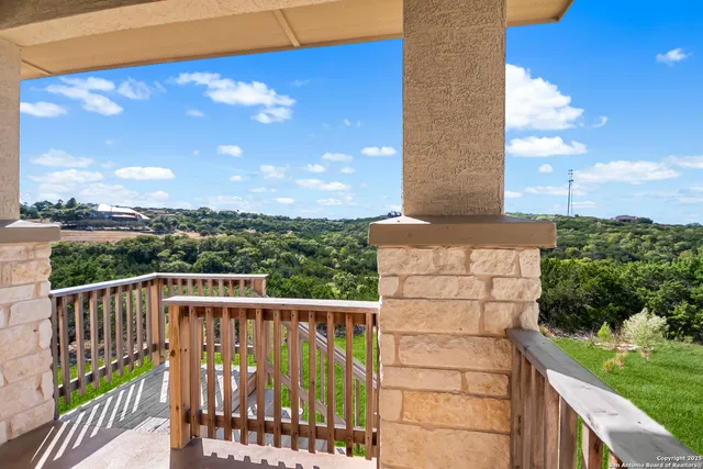 a view of a balcony with lake view