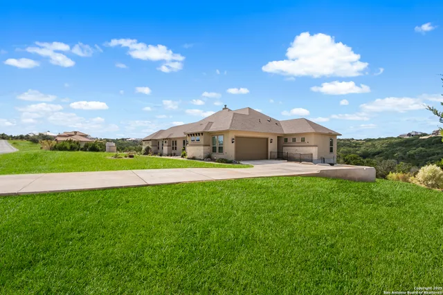 a view of a house with a big yard