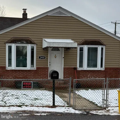 a front view of a house with garage