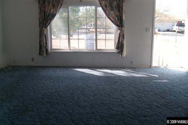 3840 Hummingbird Drive Reno, NV 89508 - Photo 6 of 9 an empty room with windows