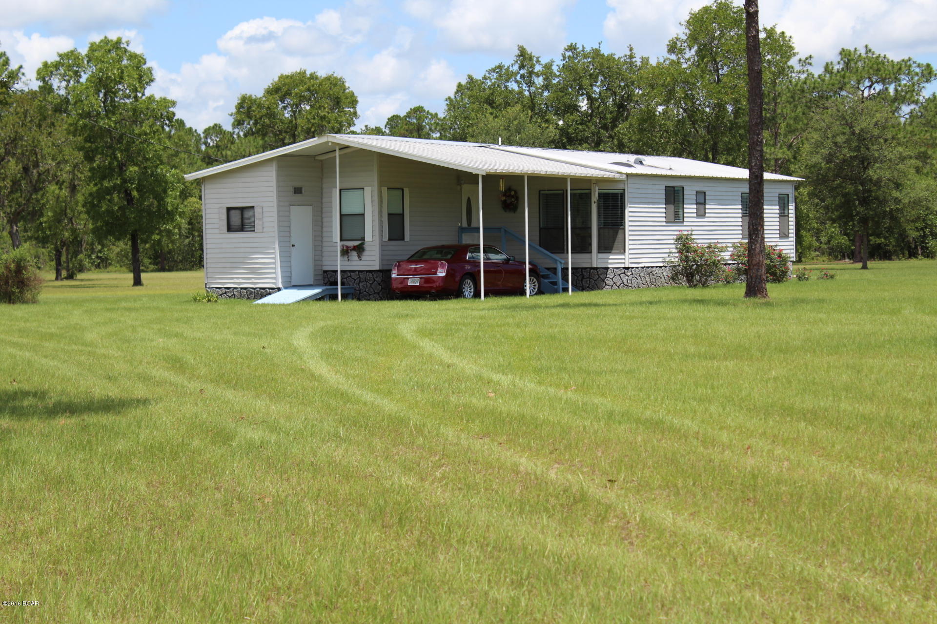 21450 Northwest Sandy Acres Road Altha, FL 32421 - Photo 1 of 25 Gallery Image 1