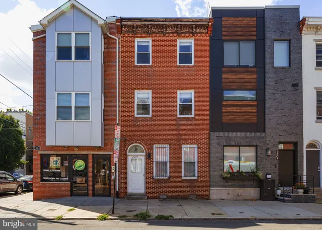 a front view of a building with street
