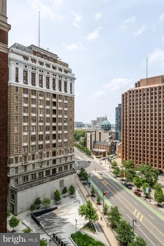 a city view with tall buildings