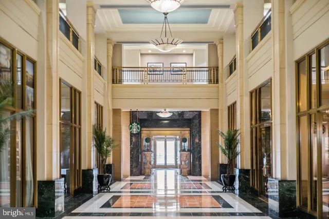 a view of an entryway with a chandelier
