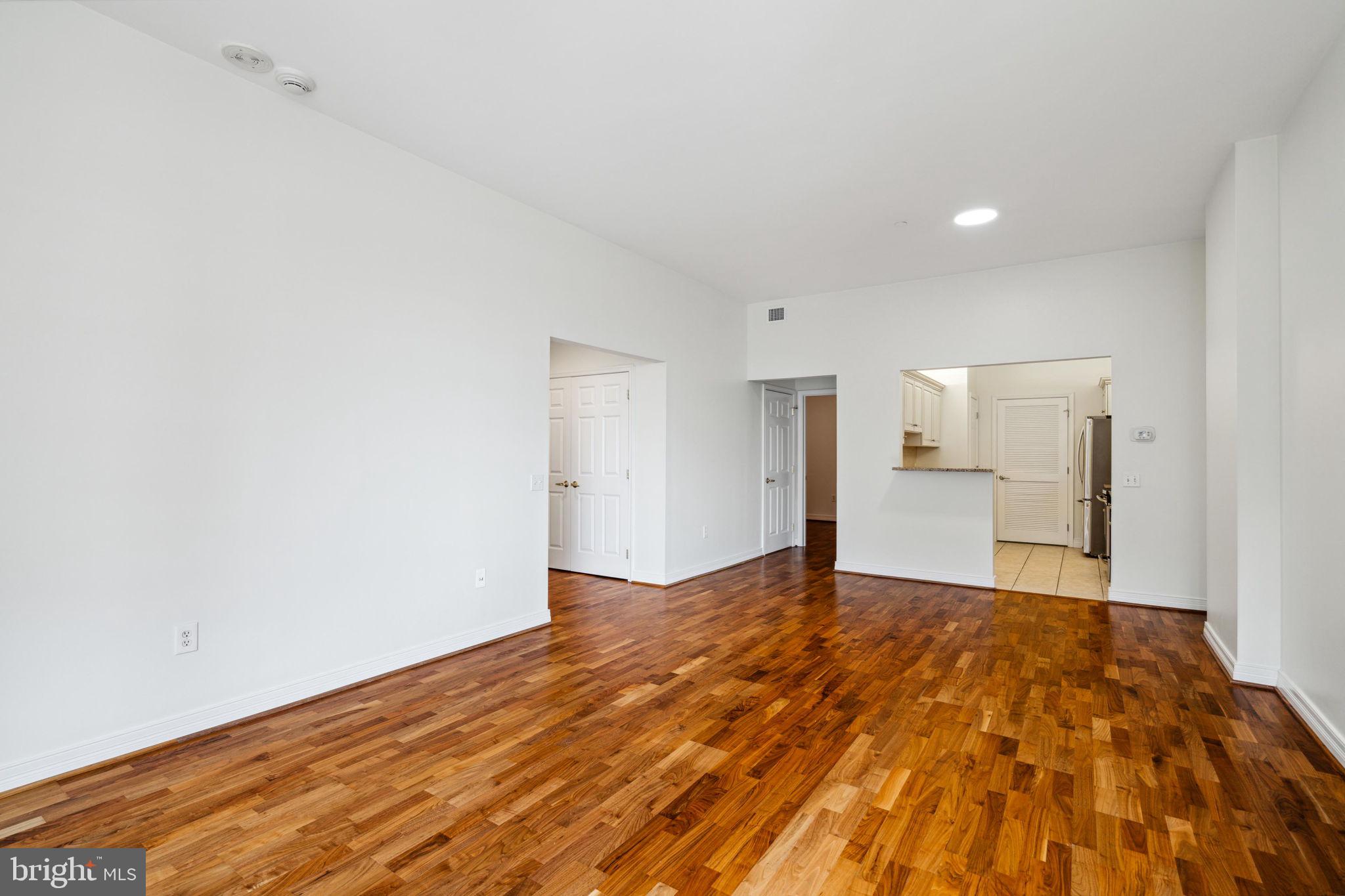 1600 Arch Street, Unit 1113 Philadelphia, PA 19103 - Photo 6 of 34 a view of empty room with wooden floor