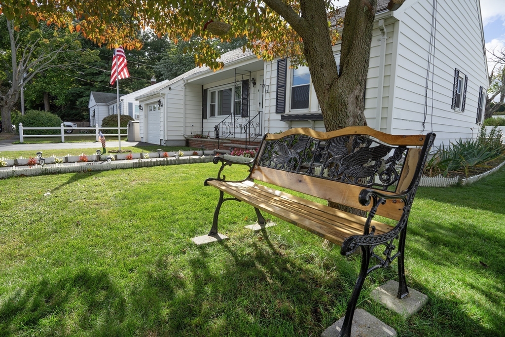 5 Hampton Street Saugus, MA 01906 - Photo 11 of 24 a view of a house with backyard sitting area and garden