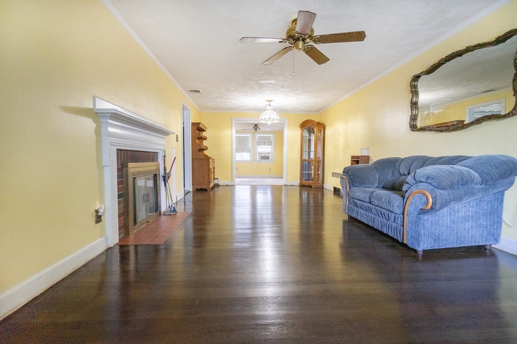5 Hampton Street Saugus, MA 01906 - Photo 13 of 24 a living room with furniture and wooden floor