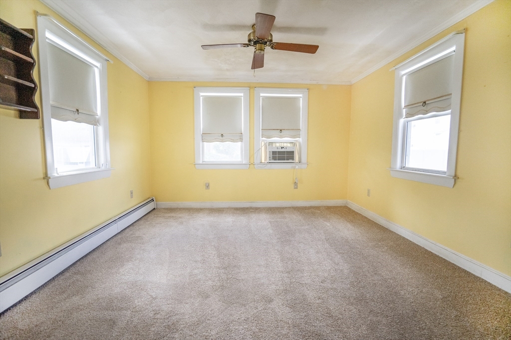 5 Hampton Street Saugus, MA 01906 - Photo 17 of 24 a view of an empty room with a window